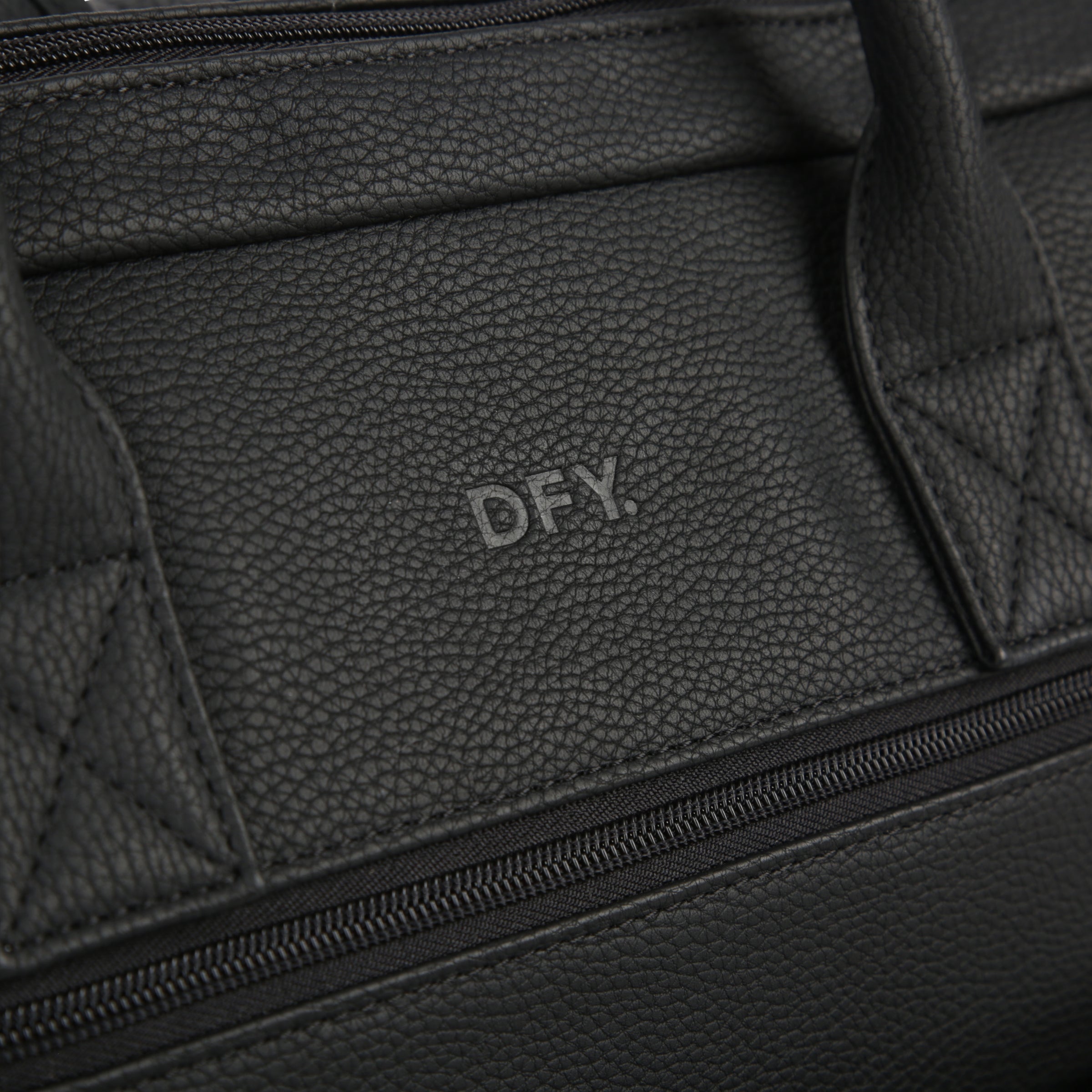 close up of brand name on diaper backpack
