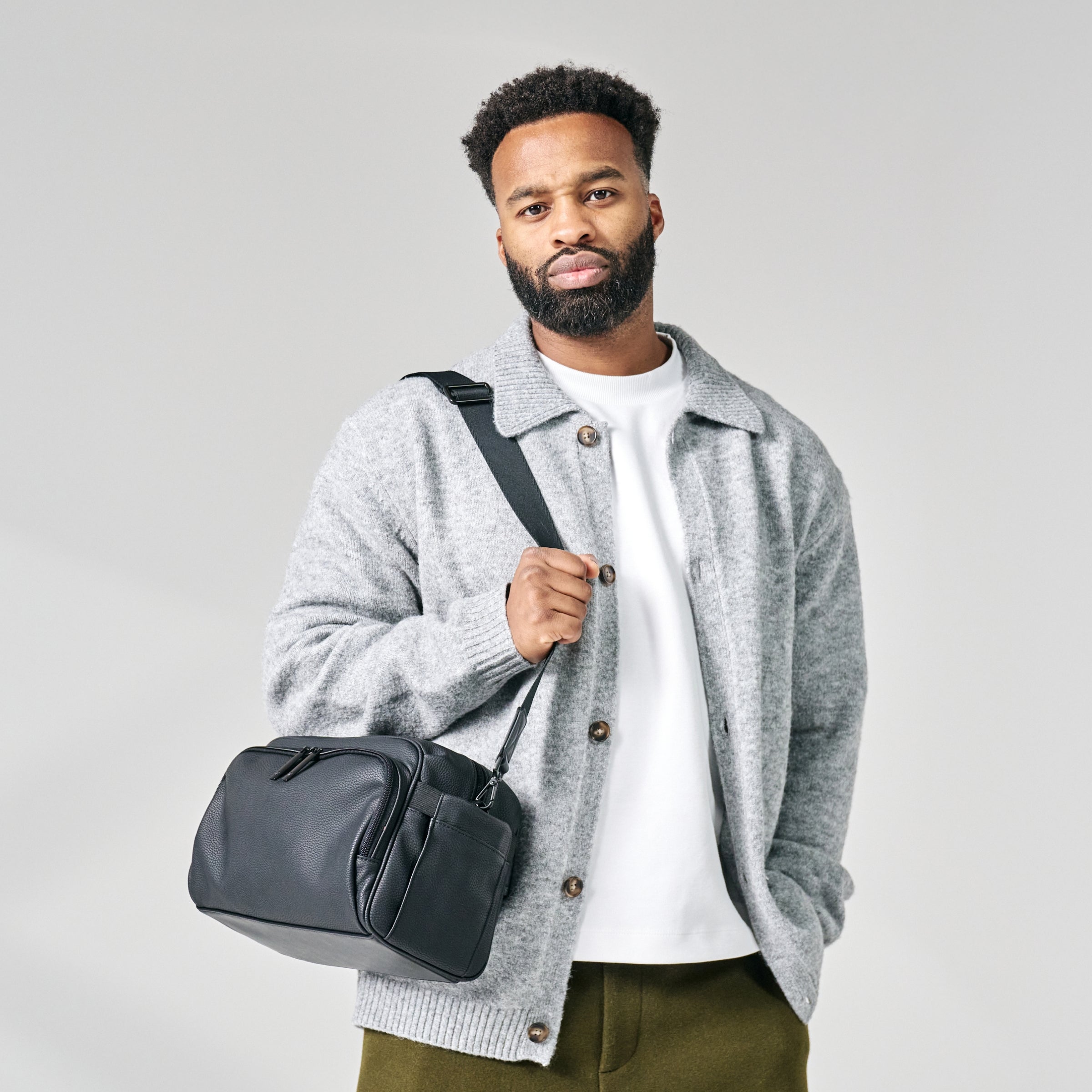 shot of dad holding diaper bag