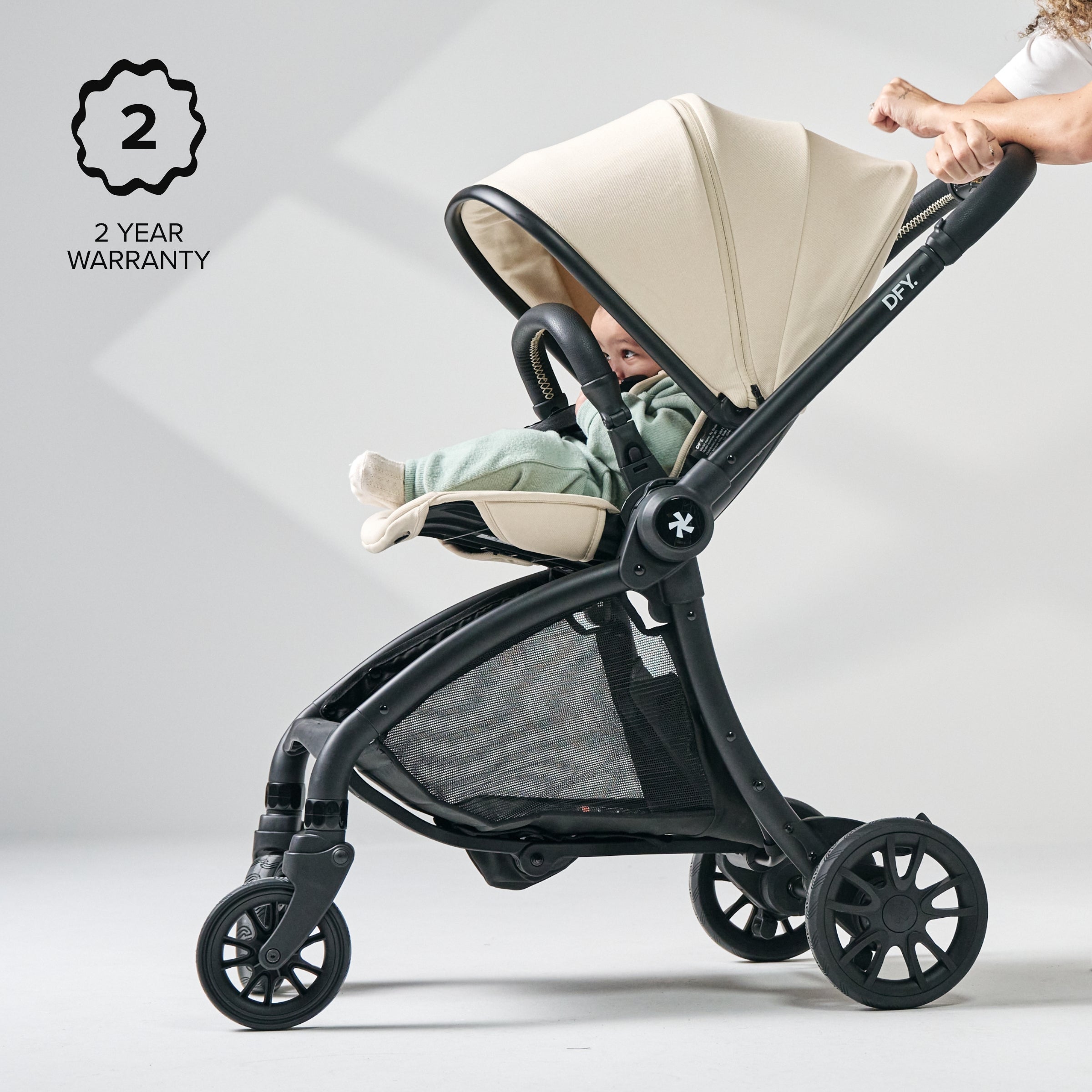 Image of stroller with 2 year warranty logo on it