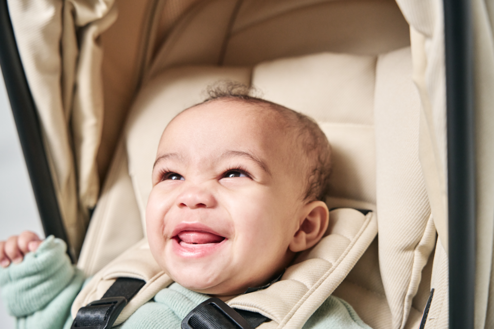 close up shot of baby in stroller