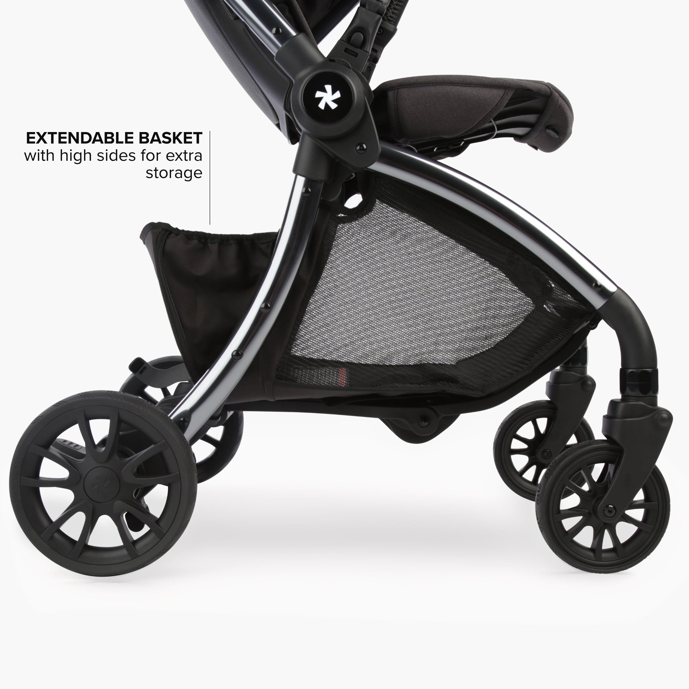 close up image of basket at the bottom of the stroller with the basket in extended position.